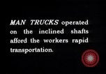Image of man-cars Kennecott Alaska USA, 1927, second 31 stock footage video 65675030414