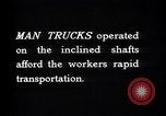 Image of man-cars Kennecott Alaska USA, 1927, second 33 stock footage video 65675030414