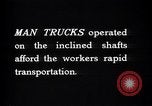 Image of man-cars Kennecott Alaska USA, 1927, second 34 stock footage video 65675030414