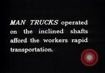 Image of man-cars Kennecott Alaska USA, 1927, second 35 stock footage video 65675030414