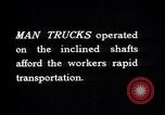 Image of man-cars Kennecott Alaska USA, 1927, second 36 stock footage video 65675030414