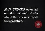 Image of man-cars Kennecott Alaska USA, 1927, second 37 stock footage video 65675030414
