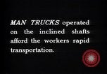 Image of man-cars Kennecott Alaska USA, 1927, second 38 stock footage video 65675030414