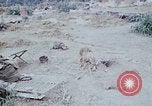 Image of bulldozer levels ground at Fire Base Myron Cambodia, 1970, second 22 stock footage video 65675030461