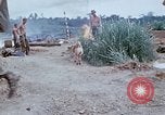 Image of bulldozer levels ground at Fire Base Myron Cambodia, 1970, second 37 stock footage video 65675030461