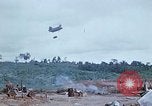 Image of bulldozer levels ground at Fire Base Myron Cambodia, 1970, second 38 stock footage video 65675030461