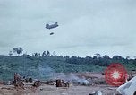 Image of bulldozer levels ground at Fire Base Myron Cambodia, 1970, second 39 stock footage video 65675030461