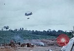 Image of bulldozer levels ground at Fire Base Myron Cambodia, 1970, second 40 stock footage video 65675030461