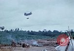 Image of bulldozer levels ground at Fire Base Myron Cambodia, 1970, second 41 stock footage video 65675030461