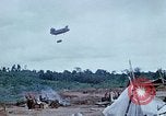 Image of bulldozer levels ground at Fire Base Myron Cambodia, 1970, second 43 stock footage video 65675030461