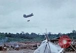 Image of bulldozer levels ground at Fire Base Myron Cambodia, 1970, second 46 stock footage video 65675030461