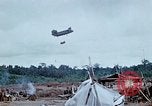 Image of bulldozer levels ground at Fire Base Myron Cambodia, 1970, second 47 stock footage video 65675030461