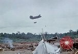 Image of bulldozer levels ground at Fire Base Myron Cambodia, 1970, second 49 stock footage video 65675030461