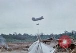 Image of bulldozer levels ground at Fire Base Myron Cambodia, 1970, second 51 stock footage video 65675030461