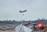 Image of bulldozer levels ground at Fire Base Myron Cambodia, 1970, second 52 stock footage video 65675030461