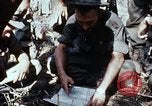 Image of jungle trail Vietnam, 1968, second 26 stock footage video 65675030468