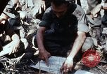 Image of jungle trail Vietnam, 1968, second 29 stock footage video 65675030468