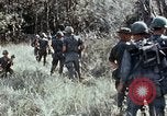Image of jungle trail Vietnam, 1968, second 33 stock footage video 65675030468