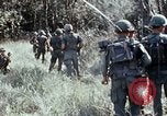 Image of jungle trail Vietnam, 1968, second 34 stock footage video 65675030468