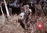 Standbild UH-1D Hubschrauber Kambodscha, 1968, aus Sekunde 10 historischem Filmmaterial Videoclip 65675030471