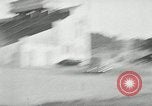Standbild Wenden mit hoher Geschwindigkeit mit dem Auto vor Stadion Akron Ohio USA, 1941, aus Sekunde 11 historischem Filmmaterial Videoclip 65675030482