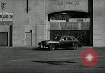 Standbild Wenden mit hoher Geschwindigkeit mit dem Auto vor Stadion Akron Ohio USA, 1941, aus Sekunde 14 historischem Filmmaterial Videoclip 65675030482