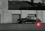 Standbild Wenden mit hoher Geschwindigkeit mit dem Auto vor Stadion Akron Ohio USA, 1941, aus Sekunde 20 historischem Filmmaterial Videoclip 65675030482