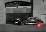 Standbild Wenden mit hoher Geschwindigkeit mit dem Auto vor Stadion Akron Ohio USA, 1941, aus Sekunde 21 historischem Filmmaterial Videoclip 65675030482