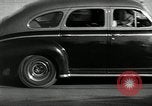 Standbild Wenden mit hoher Geschwindigkeit mit dem Auto vor Stadion Akron Ohio USA, 1941, aus Sekunde 26 historischem Filmmaterial Videoclip 65675030482