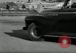 Standbild Wenden mit hoher Geschwindigkeit mit dem Auto vor Stadion Akron Ohio USA, 1941, aus Sekunde 31 historischem Filmmaterial Videoclip 65675030482
