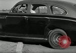 Standbild Wenden mit hoher Geschwindigkeit mit dem Auto vor Stadion Akron Ohio USA, 1941, aus Sekunde 33 historischem Filmmaterial Videoclip 65675030482