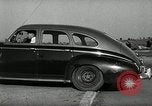 Standbild Wenden mit hoher Geschwindigkeit mit dem Auto vor Stadion Akron Ohio USA, 1941, aus Sekunde 40 historischem Filmmaterial Videoclip 65675030482