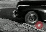 Standbild Wenden mit hoher Geschwindigkeit mit dem Auto vor Stadion Akron Ohio USA, 1941, aus Sekunde 53 historischem Filmmaterial Videoclip 65675030482
