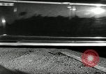 Standbild Wenden mit hoher Geschwindigkeit mit dem Auto vor Stadion Akron Ohio USA, 1941, aus Sekunde 54 historischem Filmmaterial Videoclip 65675030482