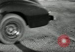 Standbild Wenden mit hoher Geschwindigkeit mit dem Auto vor Stadion Akron Ohio USA, 1941, aus Sekunde 55 historischem Filmmaterial Videoclip 65675030482