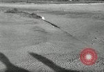 Standbild Wenden mit hoher Geschwindigkeit mit dem Auto vor Stadion Akron Ohio USA, 1941, aus Sekunde 56 historischem Filmmaterial Videoclip 65675030482