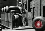 Standbild Arbeitnehmer rolling große Reifen Schläuche Akron Ohio USA, 1941, aus Sekunde 22 historischem Filmmaterial Videoclip 65675030483