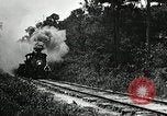 Image of railway construction and paving of muddy roads United States USA, 1927, second 11 stock footage video 65675030520