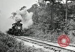 Image of railway construction and paving of muddy roads United States USA, 1927, second 12 stock footage video 65675030520