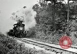 Image of railway construction and paving of muddy roads United States USA, 1927, second 13 stock footage video 65675030520