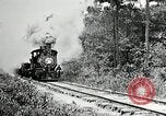 Image of railway construction and paving of muddy roads United States USA, 1927, second 14 stock footage video 65675030520