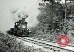 Image of railway construction and paving of muddy roads United States USA, 1927, second 15 stock footage video 65675030520