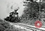 Image of railway construction and paving of muddy roads United States USA, 1927, second 16 stock footage video 65675030520