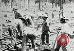 Image of railway construction and paving of muddy roads United States USA, 1927, second 30 stock footage video 65675030520