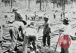 Image of railway construction and paving of muddy roads United States USA, 1927, second 31 stock footage video 65675030520