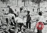 Image of railway construction and paving of muddy roads United States USA, 1927, second 32 stock footage video 65675030520
