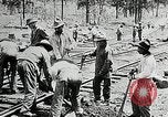 Image of railway construction and paving of muddy roads United States USA, 1927, second 33 stock footage video 65675030520
