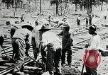 Image of railway construction and paving of muddy roads United States USA, 1927, second 37 stock footage video 65675030520