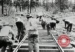 Image of railway construction and paving of muddy roads United States USA, 1927, second 41 stock footage video 65675030520