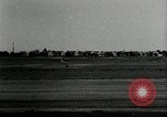 Standbild aviator Jim Mollison Roosevelt Field New York USA, 1932, aus Sekunde 34 historischem Filmmaterial Videoclip 65675030529